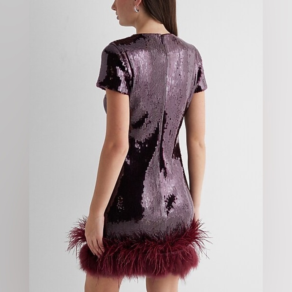 NWT express burgundy sequin feather trim
Mini dress XL $260 - Picture 5 of 9